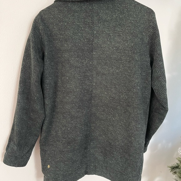 This is a lululemon cocoon coat in the color green with specs of black. - Picture 4 of 7